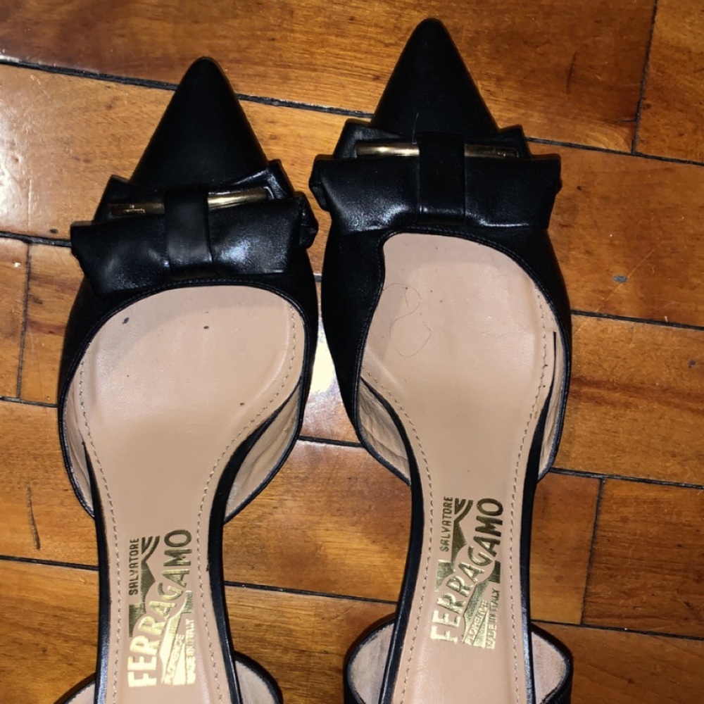 Salvatore Ferragamo black and gold flats